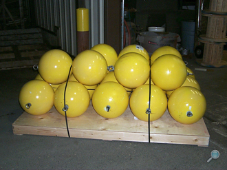 Plastic floats packaged with optional yellow paint