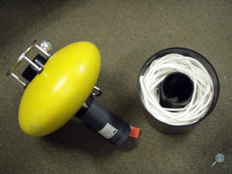 Ellipsoid-shaped pop-up buoy